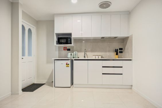 Luxury One-Bedroom Suite - kitchen